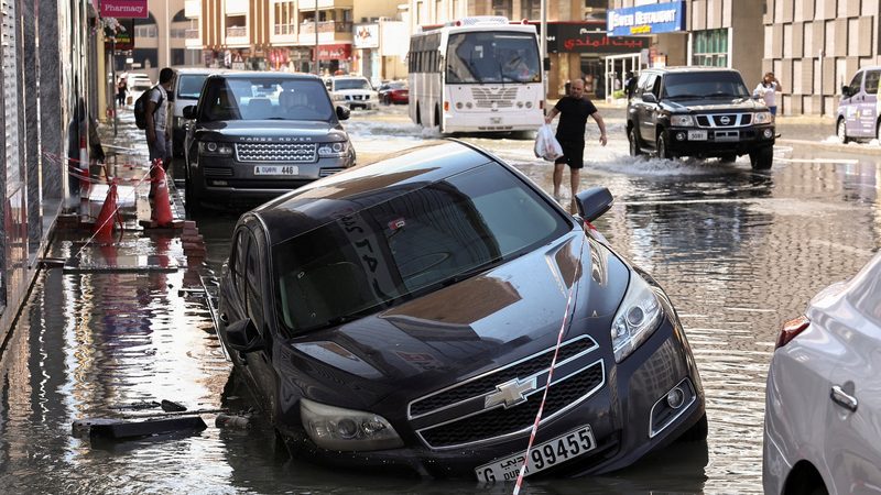 A car is stranded in flood water caused by heavy rains, in Dubai, United Arab Emirates, April 17, 2024. REUTERS/Amr Alfiky