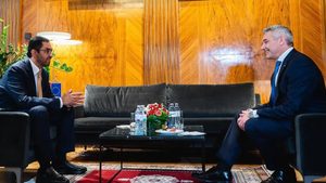 The UAE's minister of industry and advanced technology, Sultan Al Jaber, left, met Karl Nehammer, Chancellor of Austria, for talks on trade