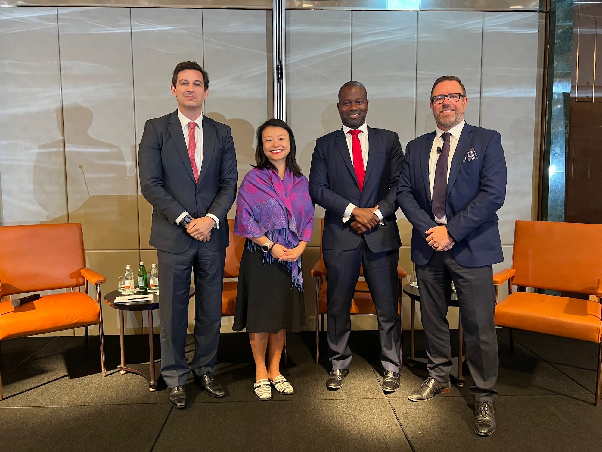 SJP's chief investment officer Justin Onuekwusi, second from right, at the event in Dubai. Other speakers included, from left, Ben Powell of the BlackRock Investment Institute, Angelina Lai of SJP Asia and Middle East, and Robert Willock of the Economist Intelligence Unit