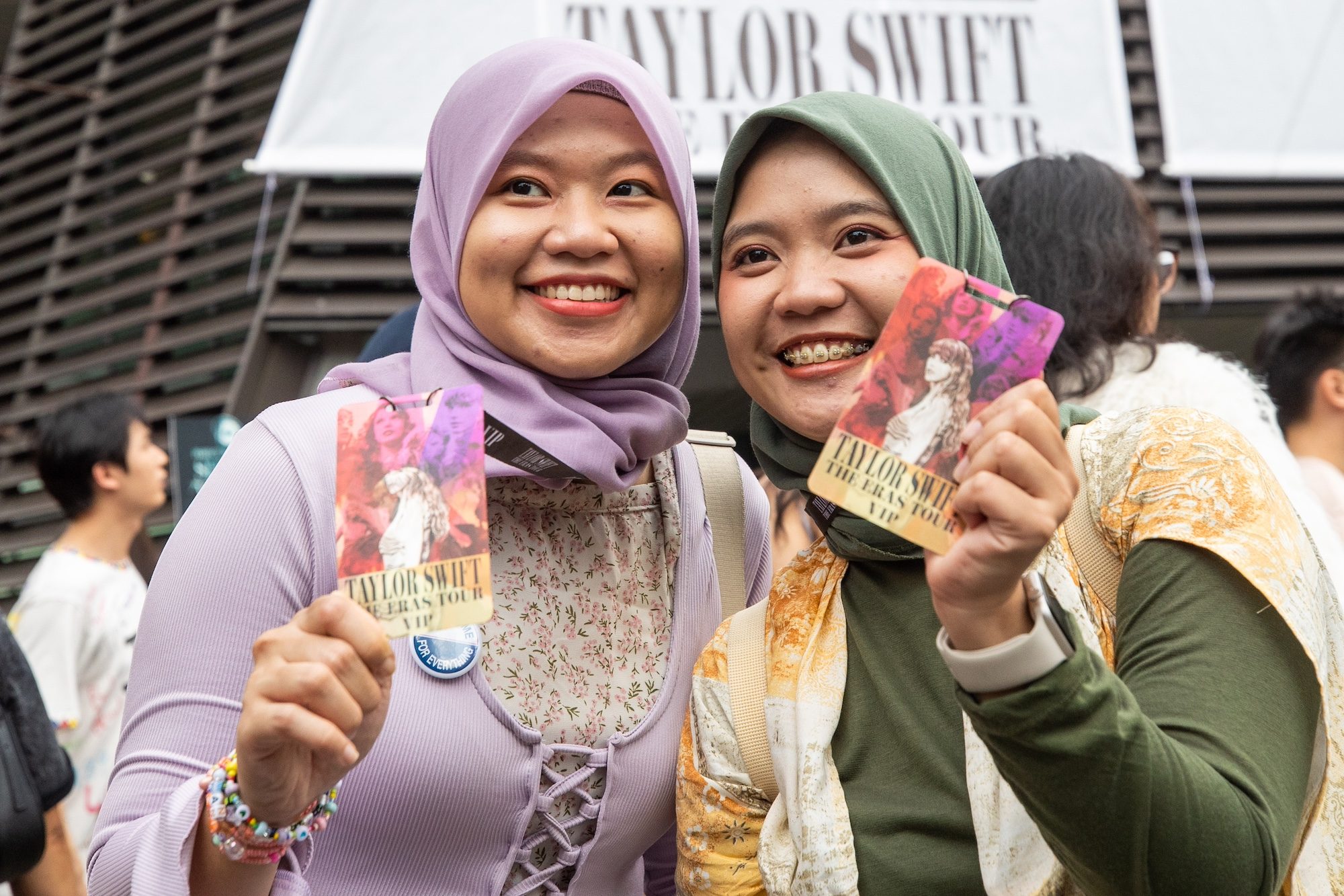 Taylor Swift fans pose ahead of her first concert in Singapore. Gulf officials could work together to attract major artists for 'Arabian tours'