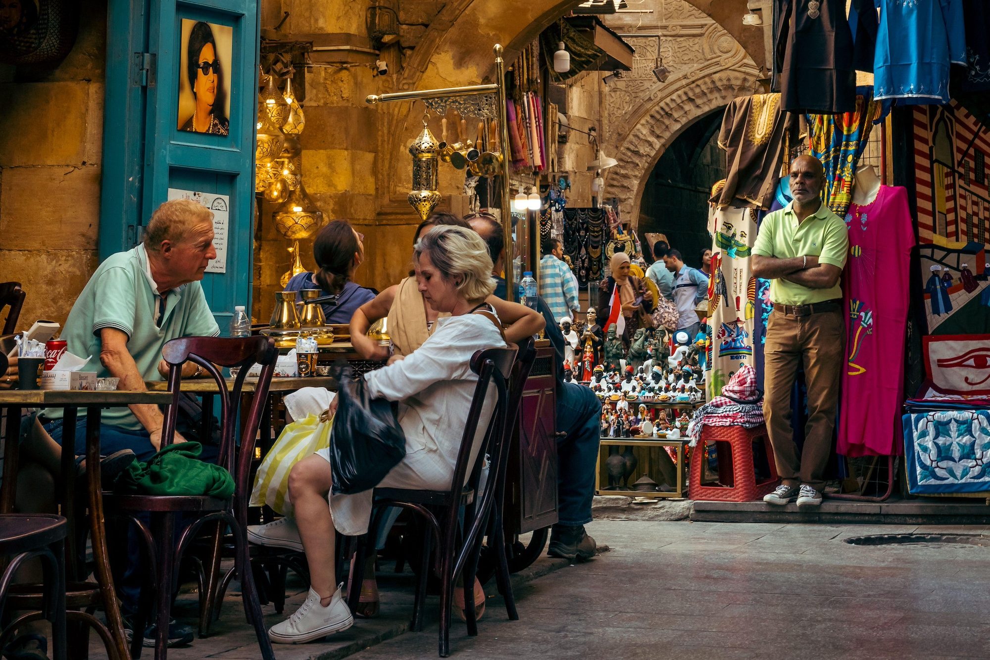 Tourists stop for a breather at a cafe in Cairo's Khan el Khalili souq. About 14.9m people visited Egypt in 2023