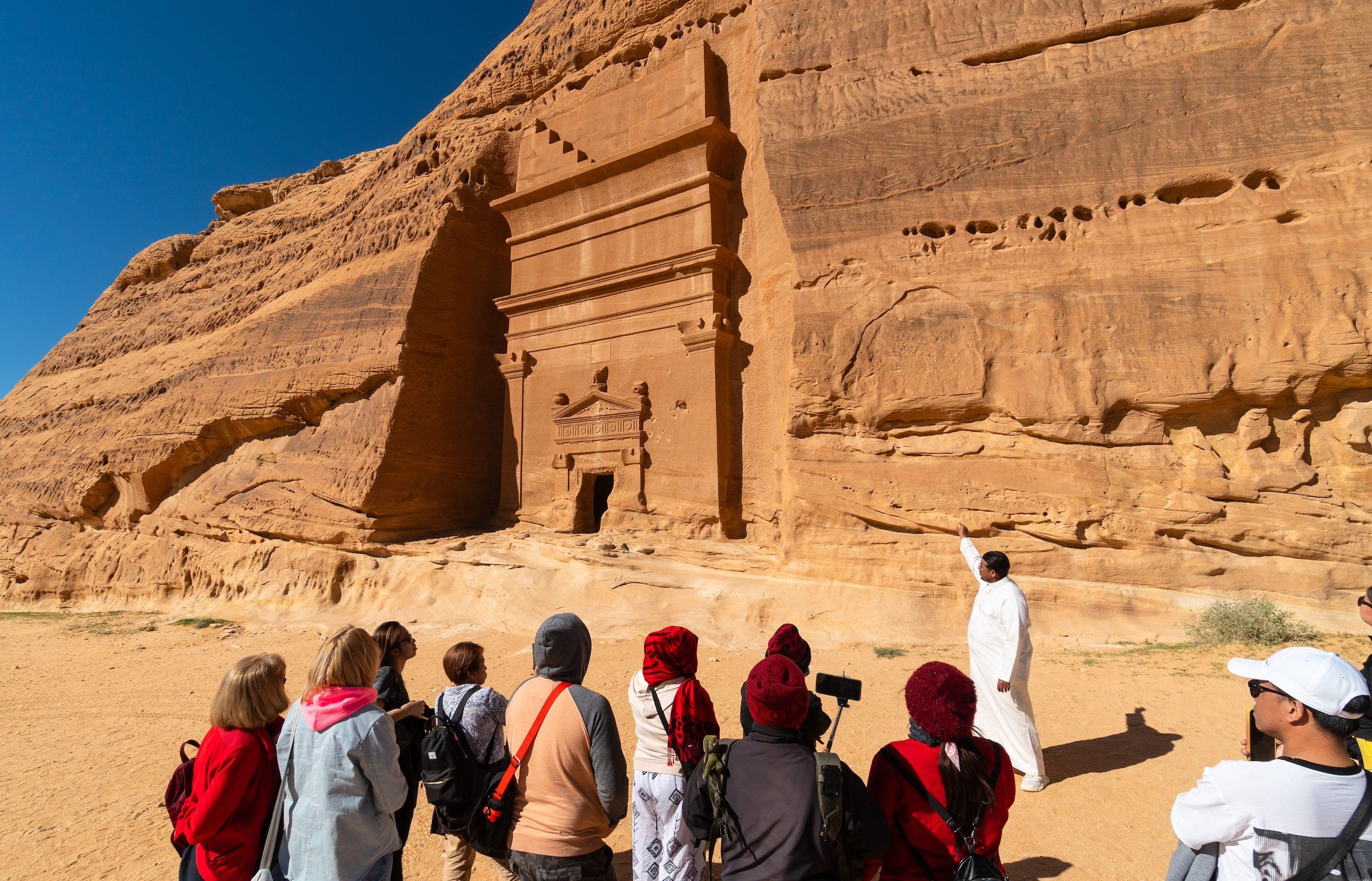 Tourists visit the tombs of the Nabatean civilisation in AlUla. Saudi Arabia's goal is for tourism to make up 10 percent of GDP by 2030