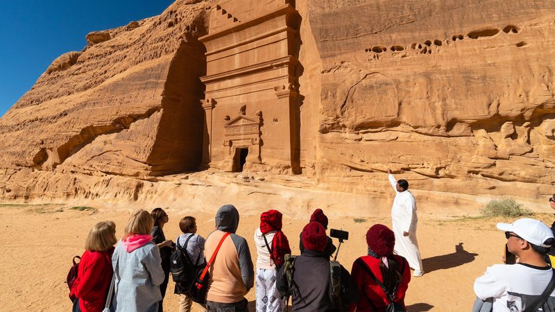 Tourists visit the tombs of the Nabatean civilisation in AlUla. Saudi Arabia's goal is for tourism to make up 10 percent of GDP by 2030