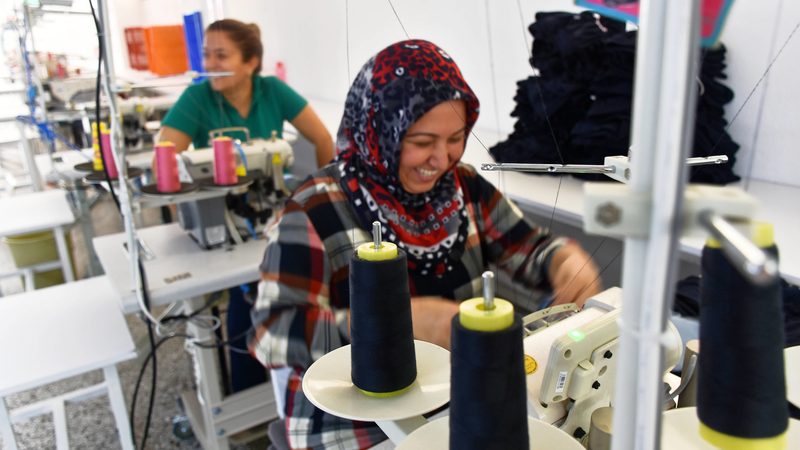 Women working at a textiles factory in Izmir; Turkish manufacturing has been hit by rising costs and interest rates but economic growth is still anticipated
