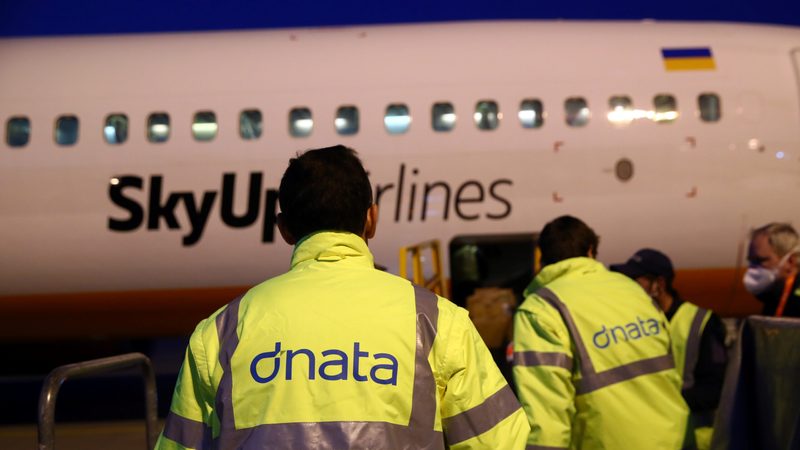 Dnata staff load cargo into a plane at Cointrin Airport in Geneva. The company's expansion into Rome will need a €20 million investment