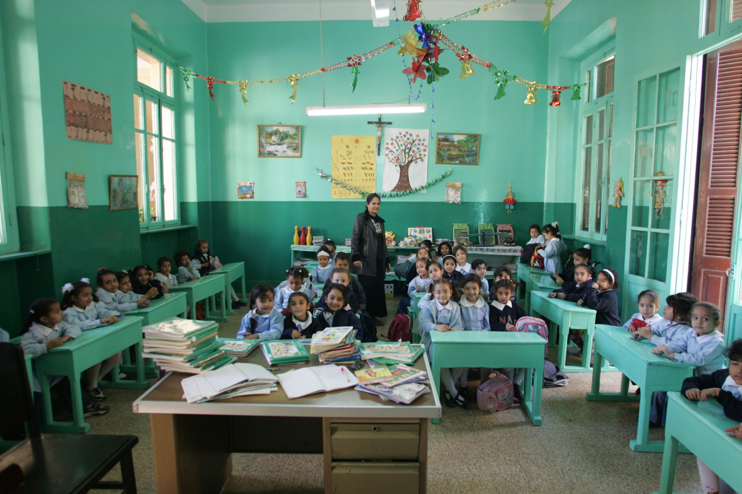 Egyptian schools sometimes operate in shifts to avoid classroom overcrowding and the country is facing a shortage of more than 300,000 teachers