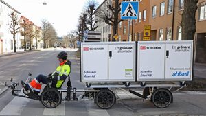 A DB Schenker cargo bike making deliveries in Linkoping, Sweden. The company employs around 70,000 people in 130 countries
