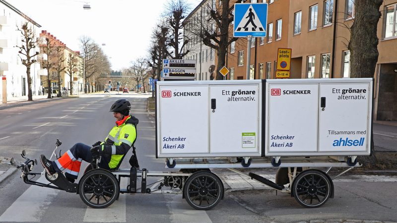 A DB Schenker cargo bike making deliveries in Linkoping, Sweden. The company employs around 70,000 people in 130 countries