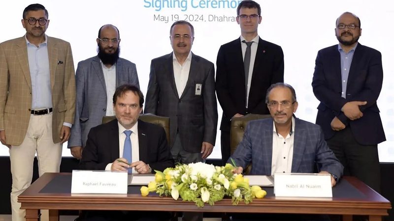 Saudi Aramco CEO Amin Nasser (centre back) at the signing ceremony for the quantum computer deal with Pasqal