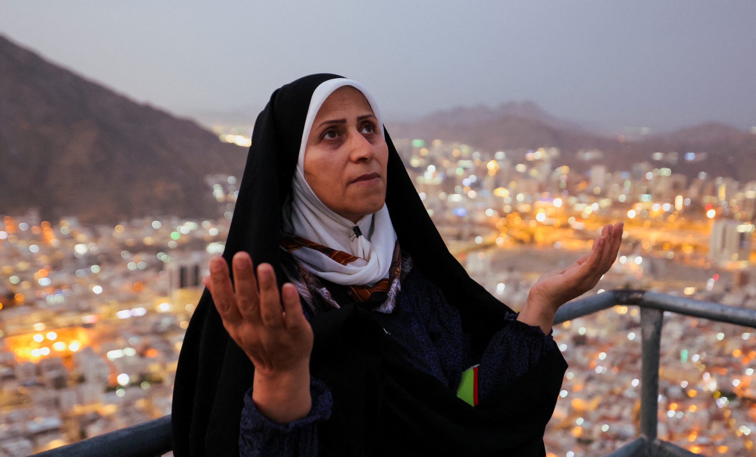 A pilgrim prays during a visit to Mount Al-Noor in the holy city of Mecca. Saudi Arabia is building an additional 320,000 hotel rooms by 2030