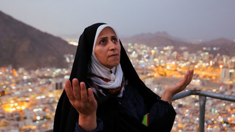 A pilgrim prays during a visit to Mount Al-Noor in the holy city of Mecca. Saudi Arabia is building an additional 320,000 hotel rooms by 2030