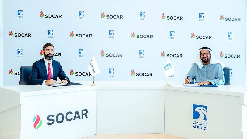 Socar president Rovshan Najaf and Adnoc upstream executive director Abdulmunim Saif Al Kindy sign the concession award