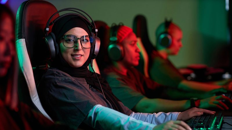 Savvy Games woman at computer