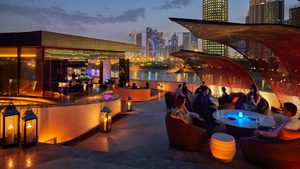 Rooftop dining at a luxury hotel in Doha. The city's construction costs rank second in the region, cheaper than Riyadh but higher than Dubai
