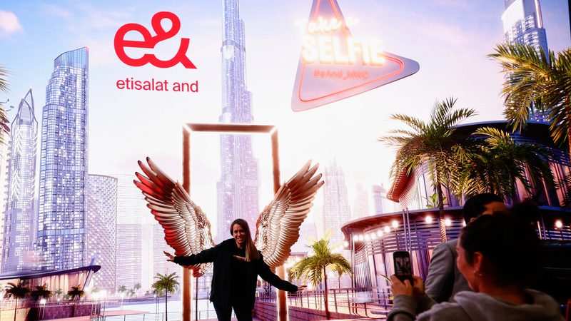 The e& stand at World Mobile Congress. The GlassHouse acquisition is its latest, following ventures in Egypt and Saudi Arabia
