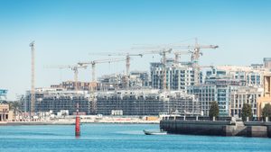 Construction cranes for a new residential area in the Bur Dubai and Creek neighbourhoods. Developers are bringing projects forward to meet demand