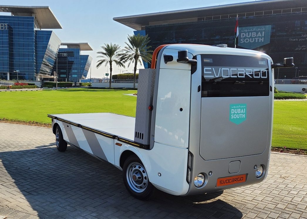 Transportation, Vehicle, Flat Bed Truck The testing was carried out on a set route in a closed area of the logistics district in Dubai South with the Evocargo N1 unmanned electric truck