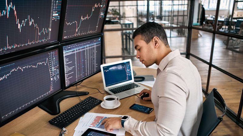 A trader monitors prices. Recent Dubai IPOs have been heavily oversubscribed
