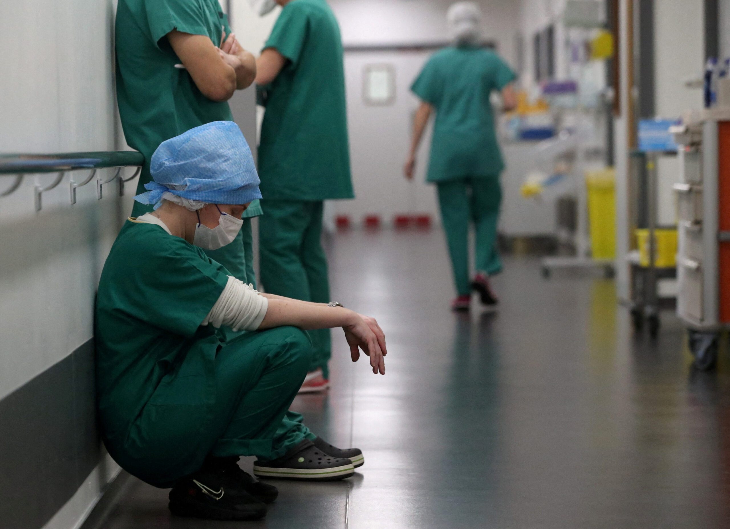Doctors take a rest in a Covid-19 intensive care unit. The Abu Dhabi platform hopes to help avert such devastating epidemics with AI