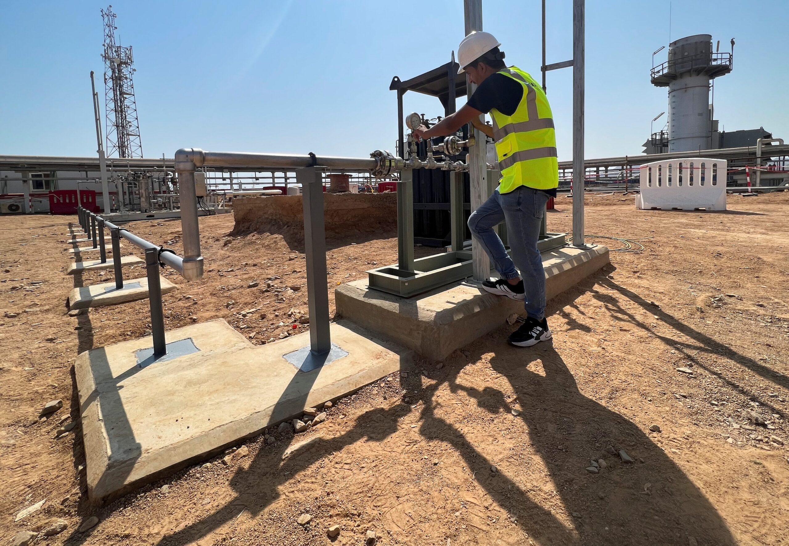 An engineer works on electricity turbines partially powered by green hydrogen in Sharm El-Sheikh, Egypt