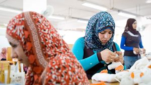 Workers at a textile factory in Bilbeis, Egypt. S&P Global says businesses may soon be able to expand their output