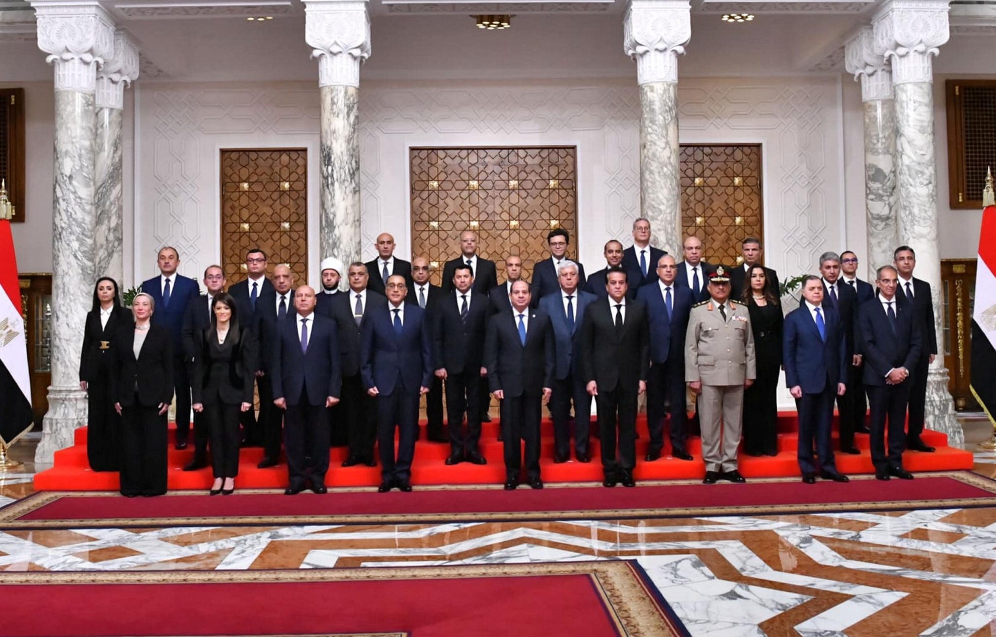 President Abdel Fattah El Sisi poses for a group photo with Egypt's new cabinet