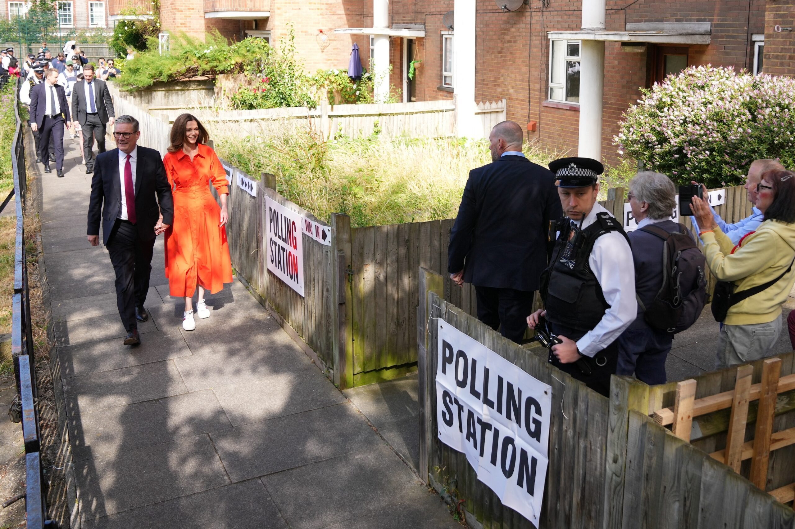 Labour Party leader Sir Keir Starmer and his wife Victoria on their way to vote during the general election 