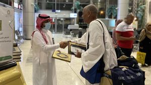 A Hajj pilgrim departs Saudi Arabia. Over 1.8m people took part in the pilgrimage in June, most of them arriving by air