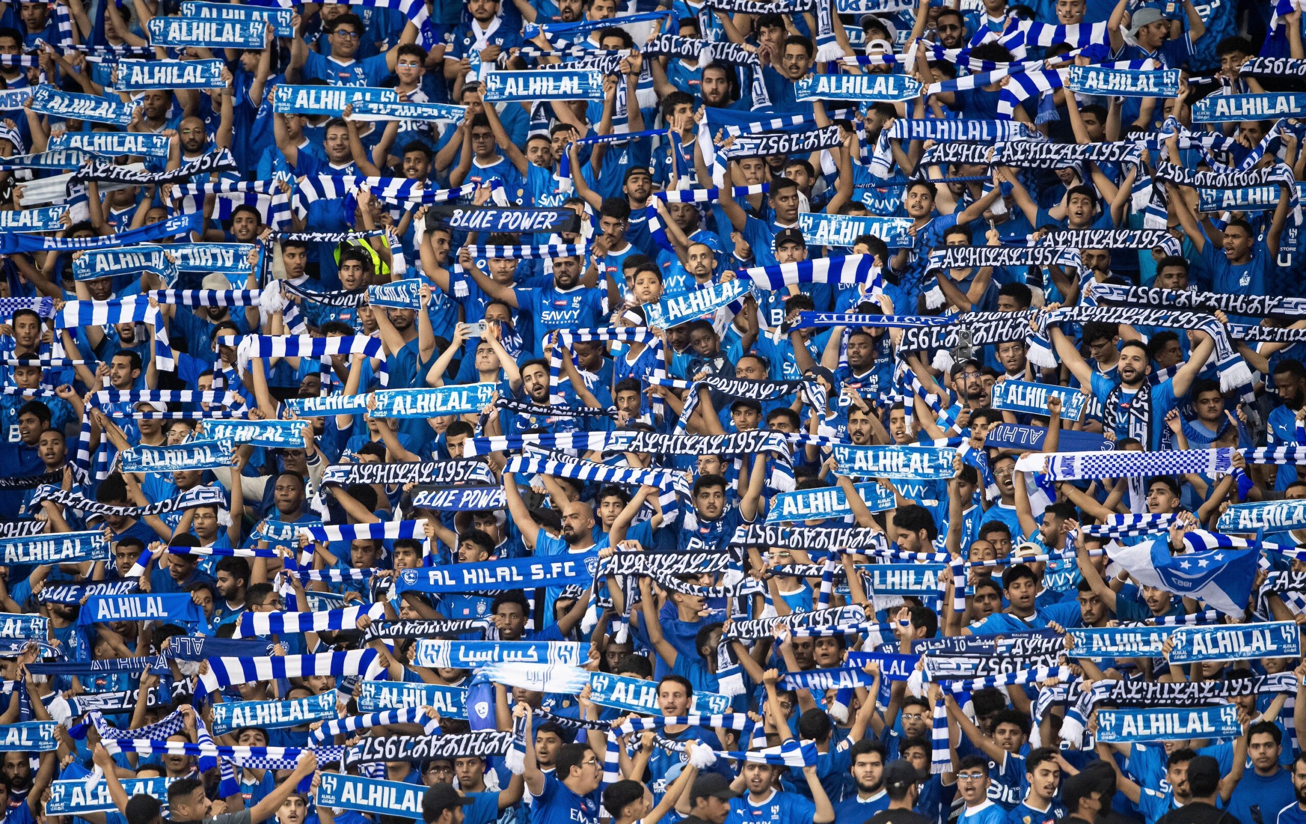 Al Hilal fans at a Pro League match against Al Ahli. Saudi Arabia's investment reforms will have a big impact on sports, experts say