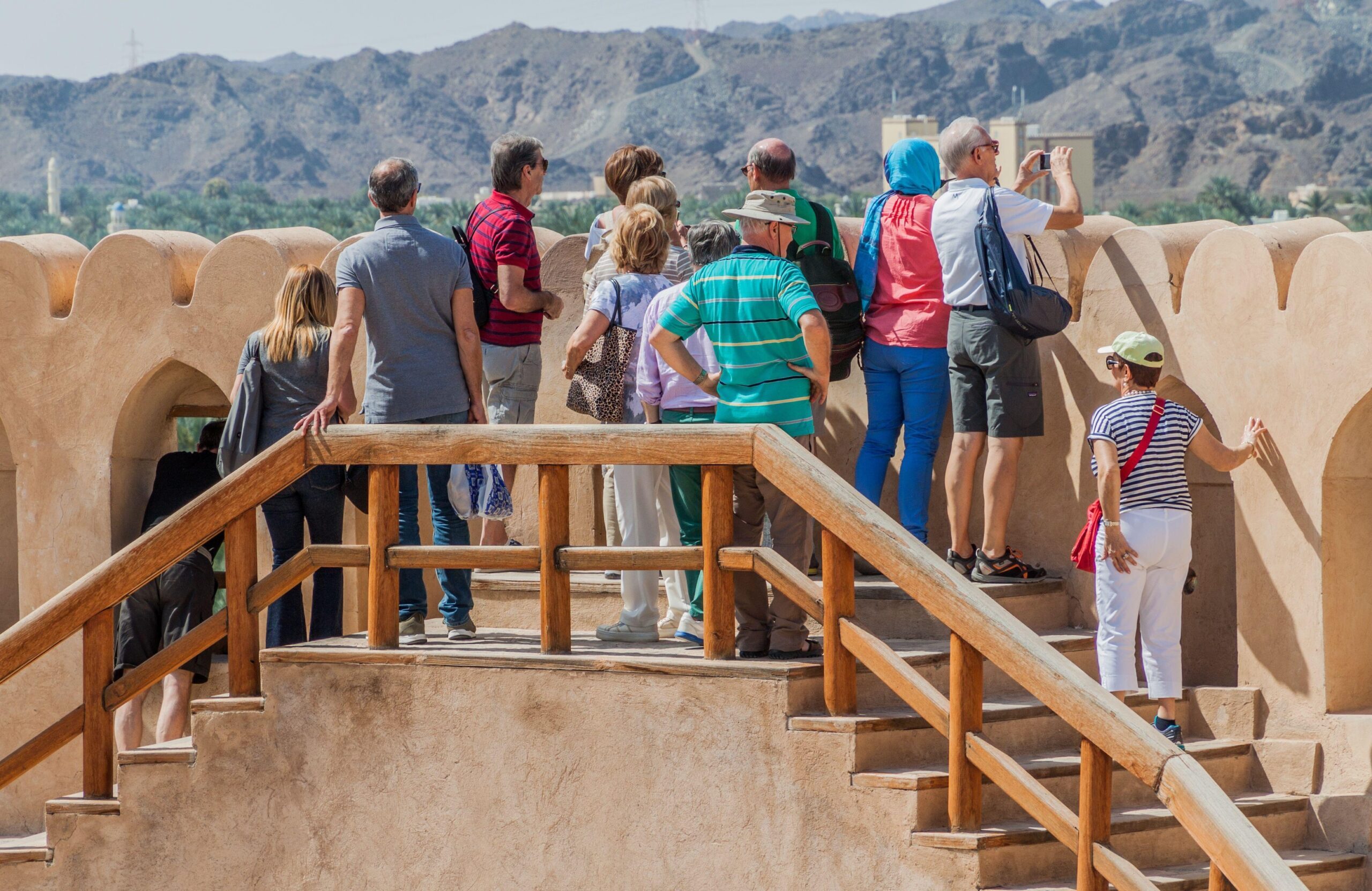 Tourists visiting Nizwa Fort in Oman. Tourism is estimated to account for 7.6% of Oman's GDP by the end of this year