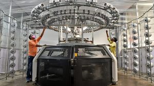 Workers operate a knitting machine at a factory in Hindupur, Andhra Pradesh. Textiles and yarns have export growth potential, according to Indian officials