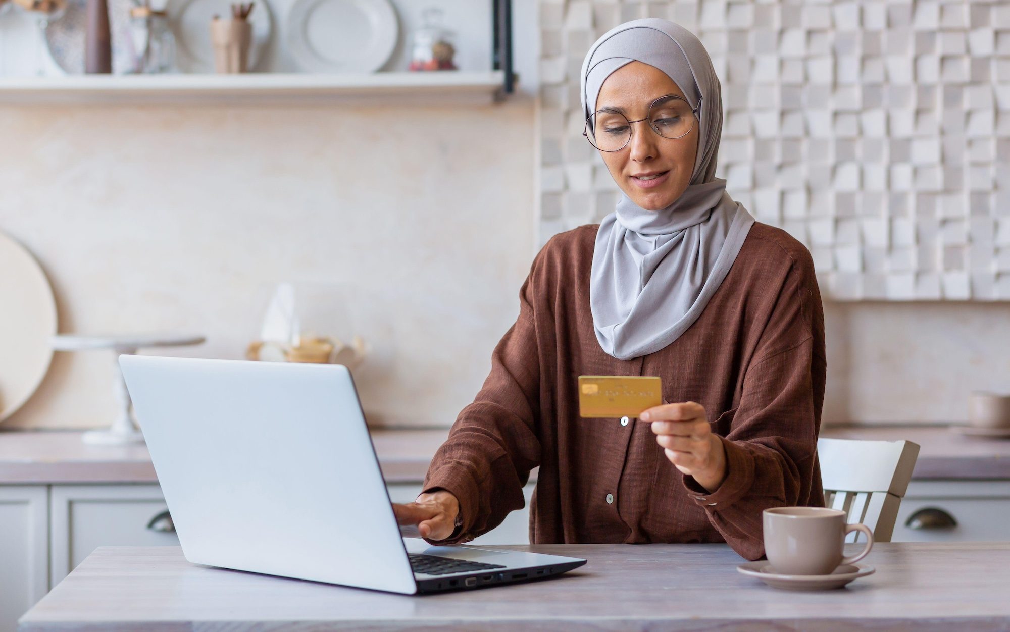 Saudi e-commerce woman shopping on laptop The growth in e-commerce is aligned with government efforts to attract venture capital and promote small businesses