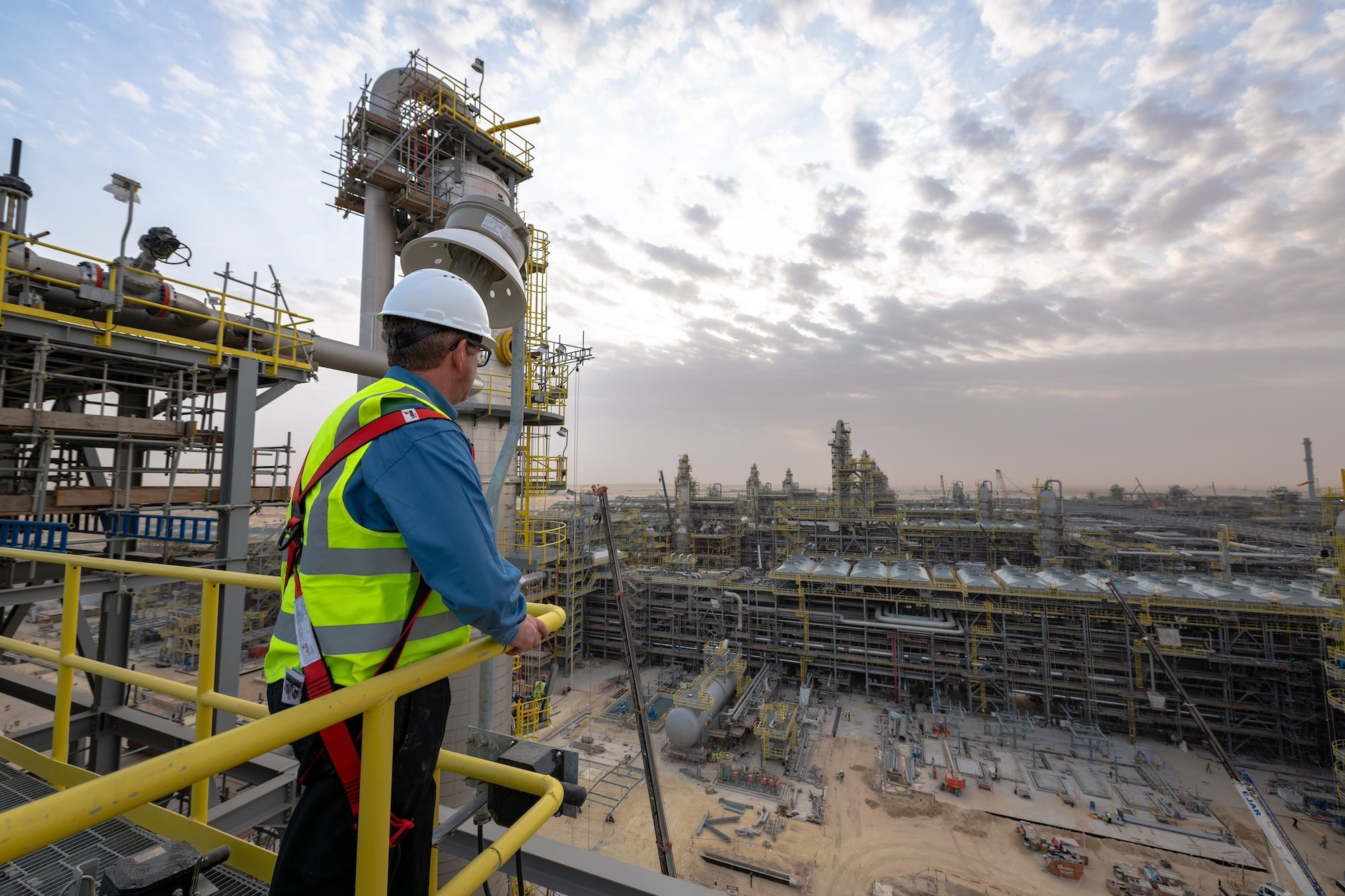 An employee inspects construction work at the Fadhili gas plant project; Aramco reported a second-quarter net profit of $28.3 billion – almost half the regional profit total – but Sico excludes the company from its calculations