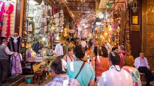 Tourists walking through the medina in Marrakech. The ancient alleyways and markets of Moroccan towns are a principal draw for tourists, says one expert