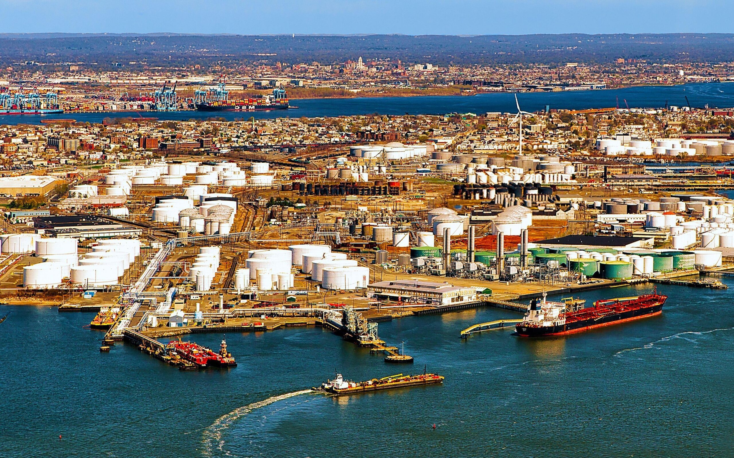 Oil storage tanks in Bayonne, New Jersey. US crude stocks rose five times higher last week than analysts' predictions