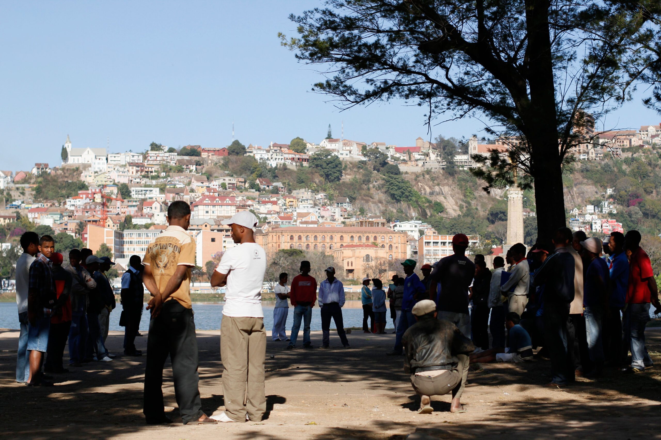 Locals playing boules by Lake Anosy in the centre of Antananarivo. Madagascar.Madagascar.