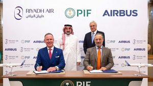 Riyadh Air CEO Tony Douglas (front left) at the signing ceremony for the company's latest Airbus order. He says the airline intends to challenge travel websites such as Expedia and Booking.Com