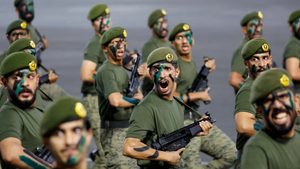 Members of Saudi Arabia's security forces participate in a parade in Mecca. Military spending decreased by 6.3 percent in the first half of the year