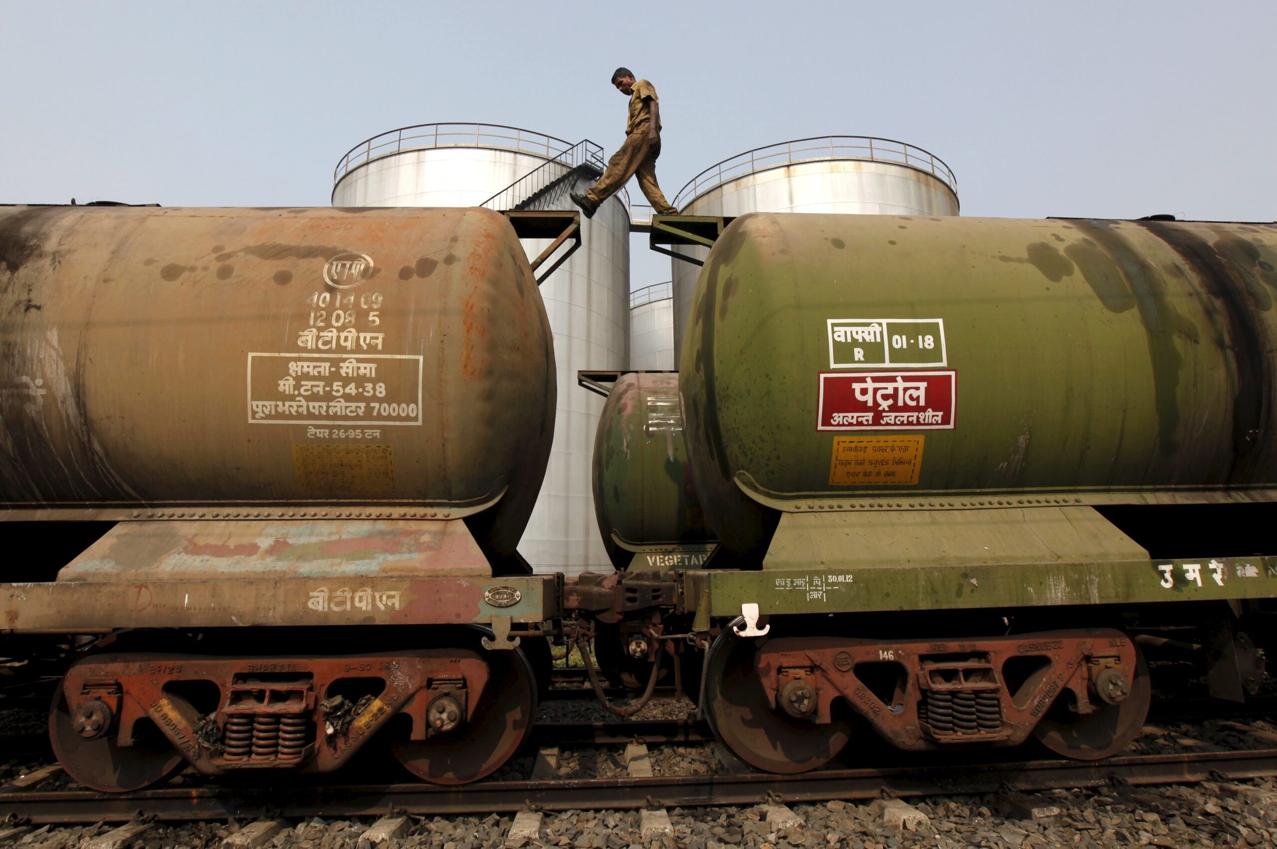 A worker at a Kolkata oil terminal. India imports vast amounts of oil and the UAE's contribution has grown
