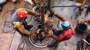 Workers on an oil rig in New Mexico, US. The incoming Trump administration is giving Opec+ plenty to think about
