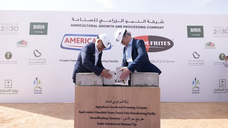Company executives laying the foundation stone for the new frozen fries factory in Riyadh