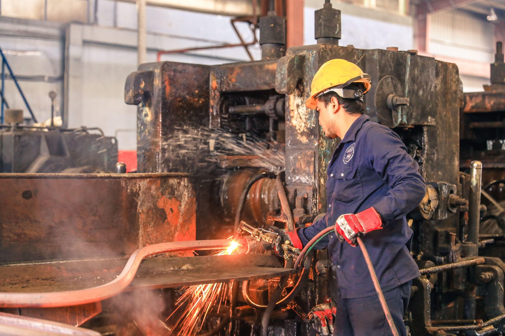 A metal worker at a factory in Dammam. Saudi Arabia logged increases in sales and employment in October, says S&P Global