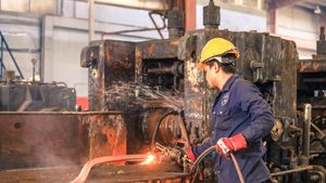 A metal worker at a factory in Dammam. Saudi Arabia logged increases in sales and employment in October, says S&P Global