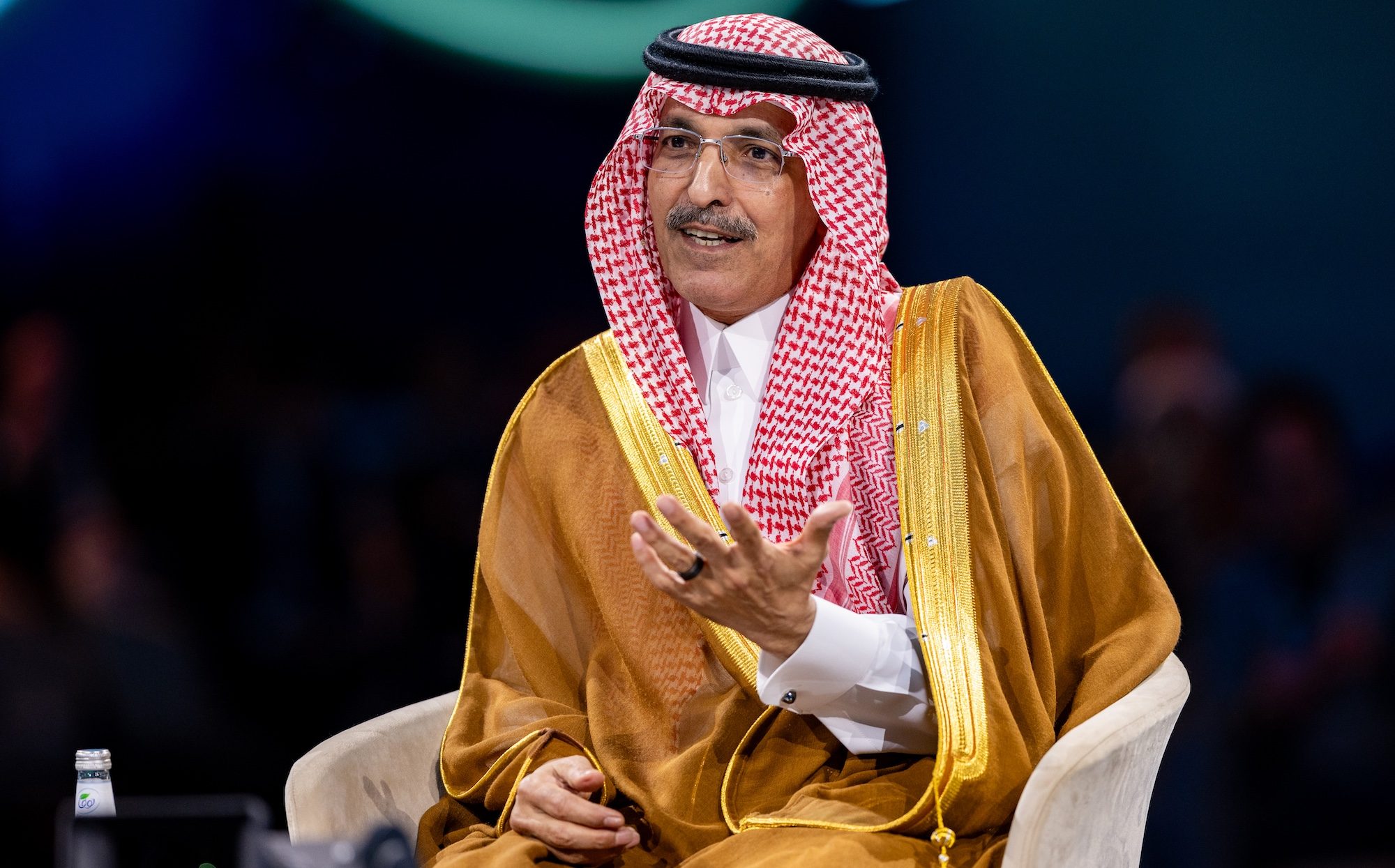 Saudi Arabia's finance minister Mohammed Al Jadaan on stage at the FII conference. The country's revenue has risen 12%