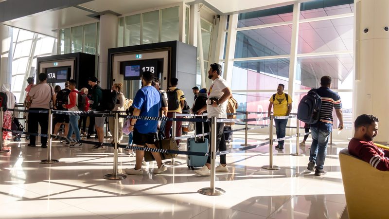 Passengers at Bahrain airport. British Airways has been flying there for 92 years