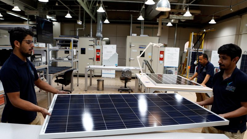 Workers at a solar panel factory in Uyayna, Saudi Arabia. The country's main non-oil trading partners are China, India, Japan and South Korea