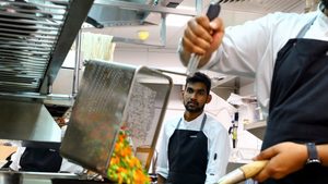 Chefs prepare food in a Dubai restaurant, where the sector is said to be close to saturation point