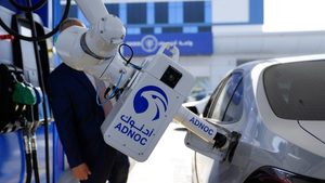 Adnoc demonstrates a robotic fueling arm. The expected GCC growth will be due to higher oil production, as Opec+ has gradually liberalised production quotas in 2024
