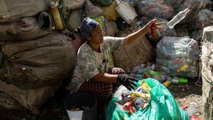 A woman sorts plastic bottles in Quezon City, Philippines. 170 nations took part in the latest round of UN talks
