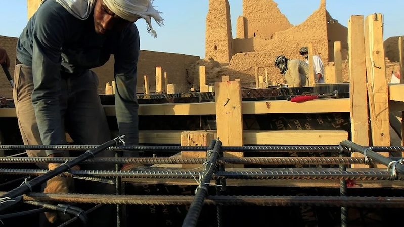A worker restoring the Diriyah district. Excavated materials will be crushed and repurposed for road bases and landscaping
